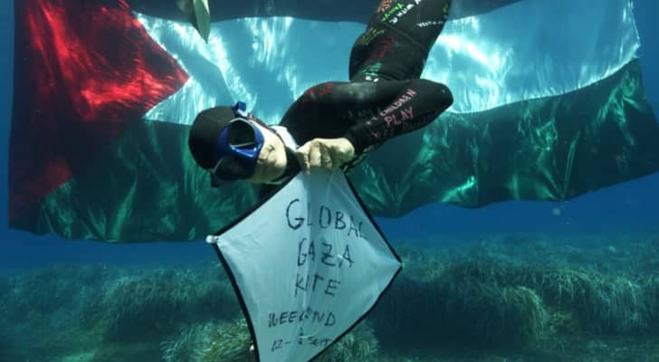 World freediving champion Alessia Zecchini dives with Palestinian flag