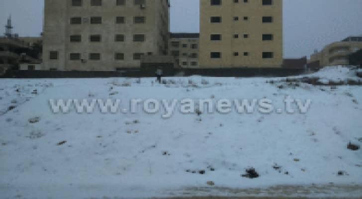 شاهد بالصور: تراكمات الثلوج في منطقة تلاع العلي بالعاصمة عمان صباح السبت