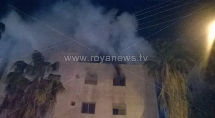 حريق في عمارة سكنية بالقرب من حدائق الملك عبدالله بالعاصمة عمان 