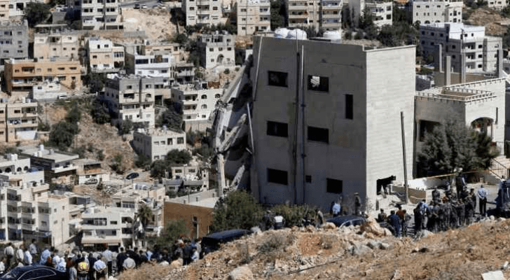 صورة من موقع البناية التي تحصن بها عناصر خلية السلط - ارشيفية