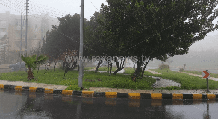 الأمطار في أحد شوارع العاصمة عمان