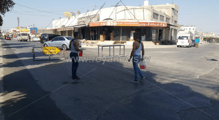 شابان يهددان بحرق نفسيهما في اربد
