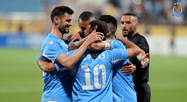 لاعبو الفيصلي يحتفلون بهدف خلال البطولة