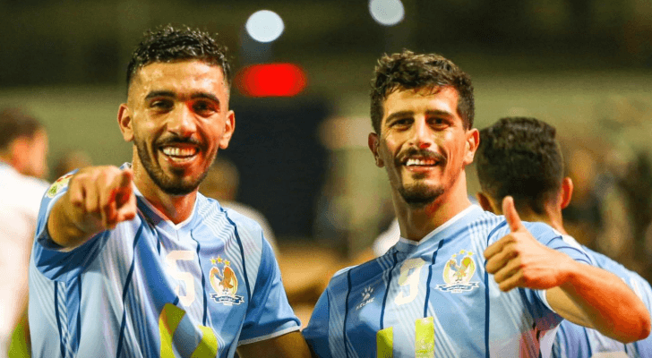 لاعبا الفيصلي بعد تسجيل هدف الفوز