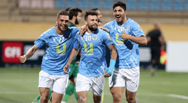 لاعبو الفيصلي يحتفلون بهدف