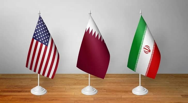 أعلام أمريكا وقطر وإيران